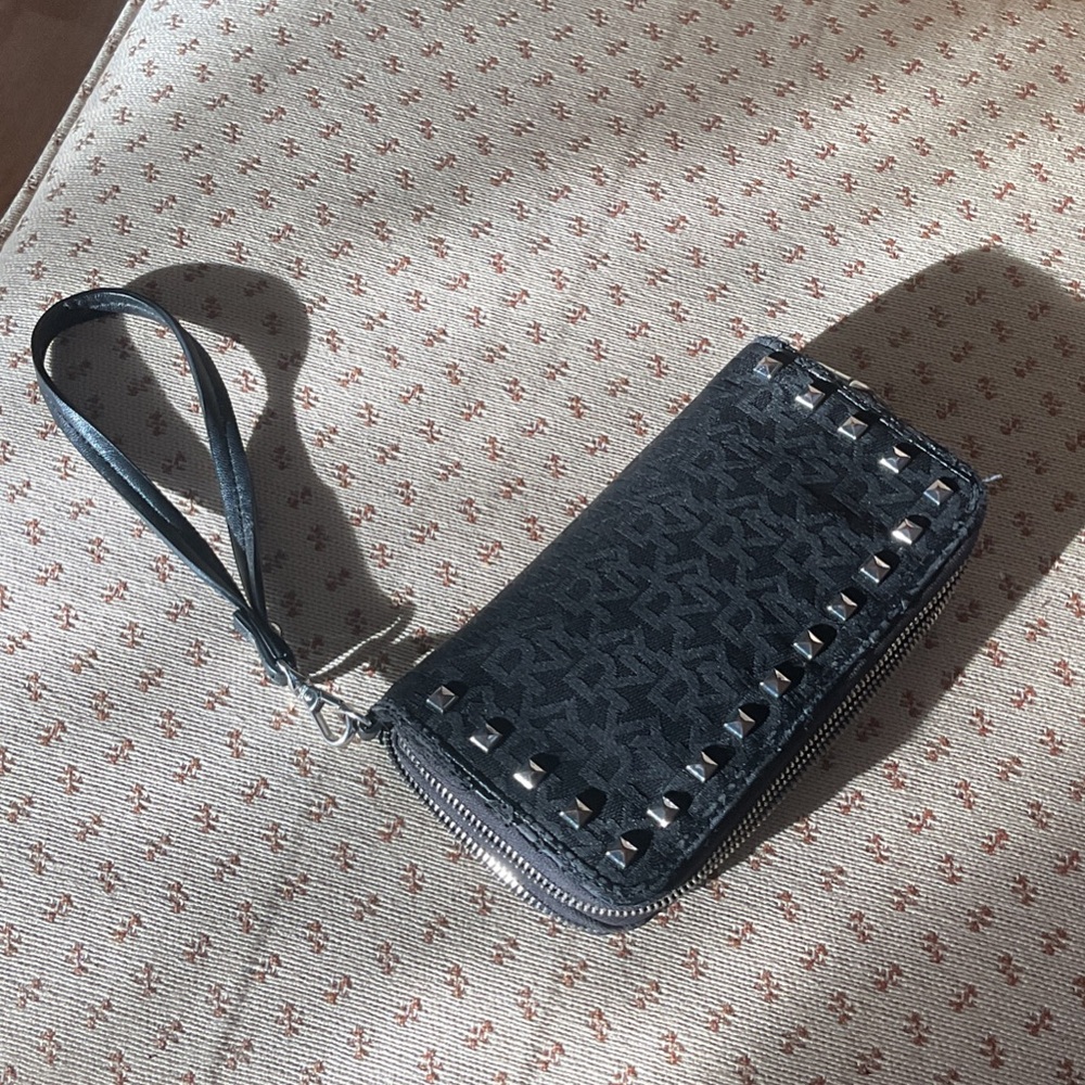 Stylish DKNY Black Wristlet with Silver Accents